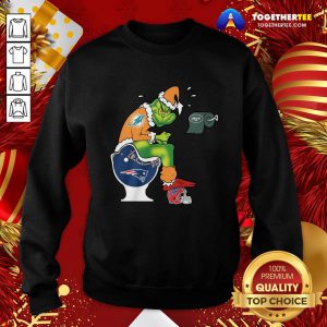 Top The Grinch Miami Dolphins Shit On Toilet New England Patriots And Other Teams Christmas Sweatshirt - Design By Togethertee.com