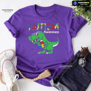 Autism Awareness Dinosaur Puzzle Pieces T-Shirt - Women's Tee