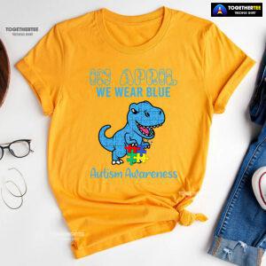 In April We Wear Blue Dinosaur Autism Awareness - Kids Tee