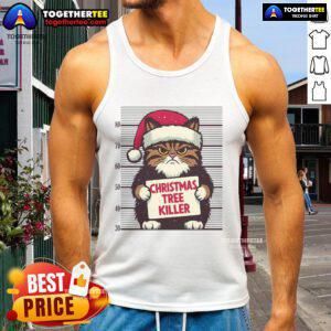 Funny cat in a red Santa hat, mugshot style, next to a Christmas tree, perfect for holiday humor. Merry Christmas!