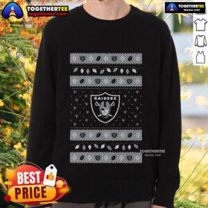 Cozy Nice Las Vegas Raiders holiday Christmas sweatshirt featuring team colors and festive design for fans.