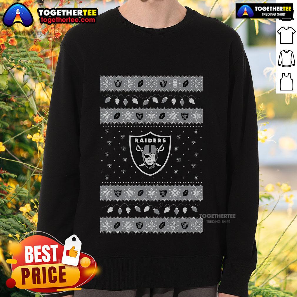 Cozy Nice Las Vegas Raiders holiday Christmas sweatshirt featuring team colors and festive design for fans.