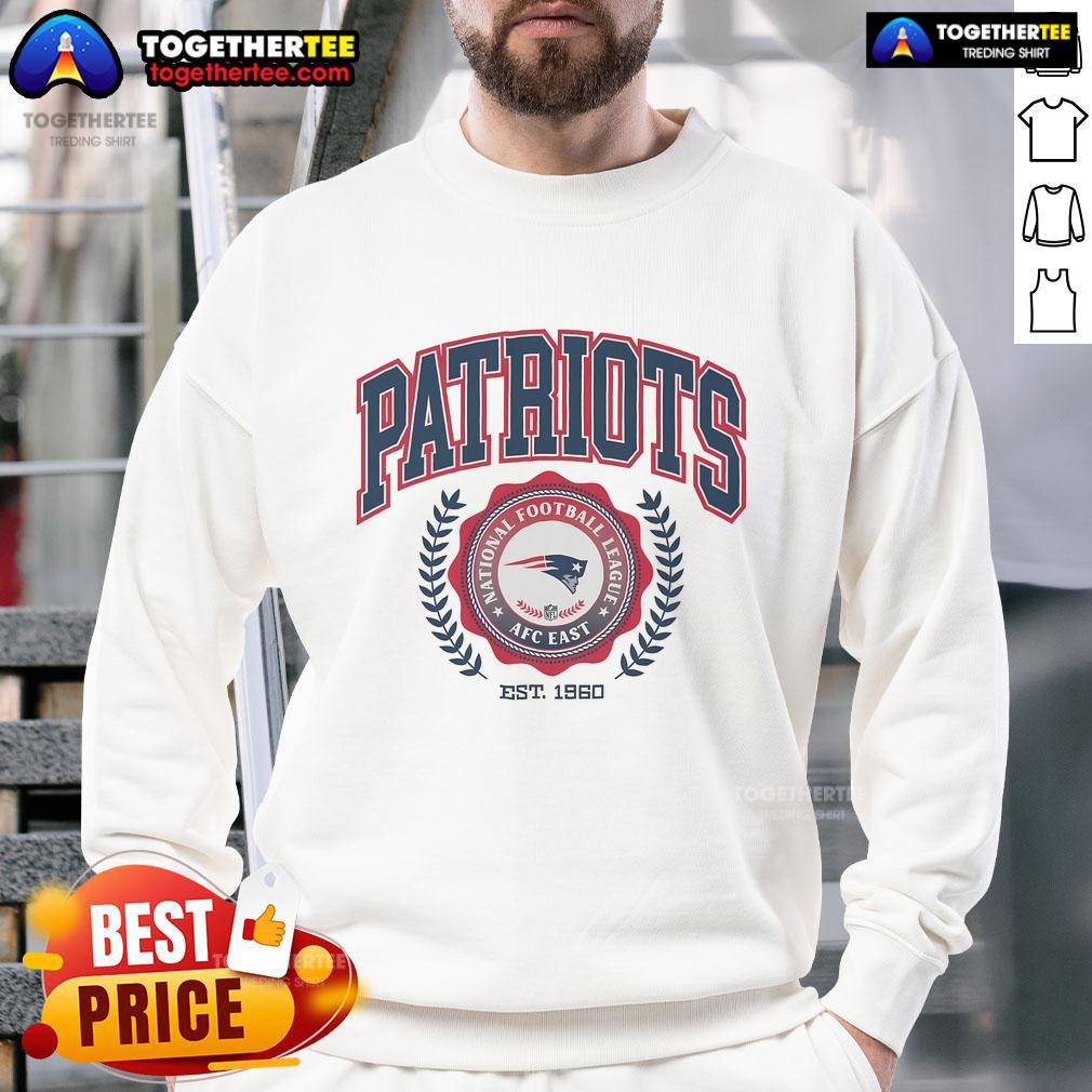 New England Patriots sweatshirt featuring team crest established in 1960, perfect for fans and casual wear.