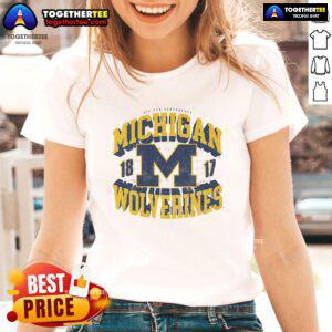 Official Michigan Wolverines Field Arched Wordmark 1817 Ladies Tee featuring bold team colors and stylish design.