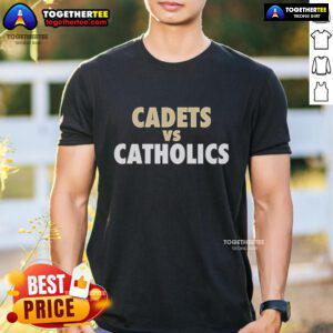 Official New Orleans Saints Cadets Vs Catholics T-Shirt featuring team logos and vibrant colors for fans.