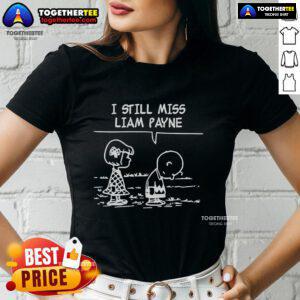 Premium 'I Still Miss Liam Payne' Peanuts ladies tee featuring a playful graphic design perfect for fans.