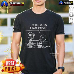 Alt Text: Premium I Still Miss Liam Payne Peanuts T-Shirt featuring a playful design with iconic characters and vibrant colors.