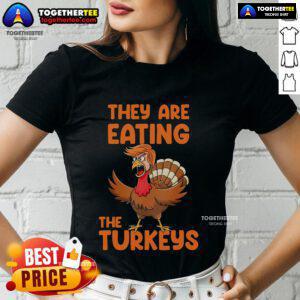 Premium 'They Are Eating The Turkeys' Thanksgiving Trump Turkey Ladies Tee featuring a humorous turkey graphic.