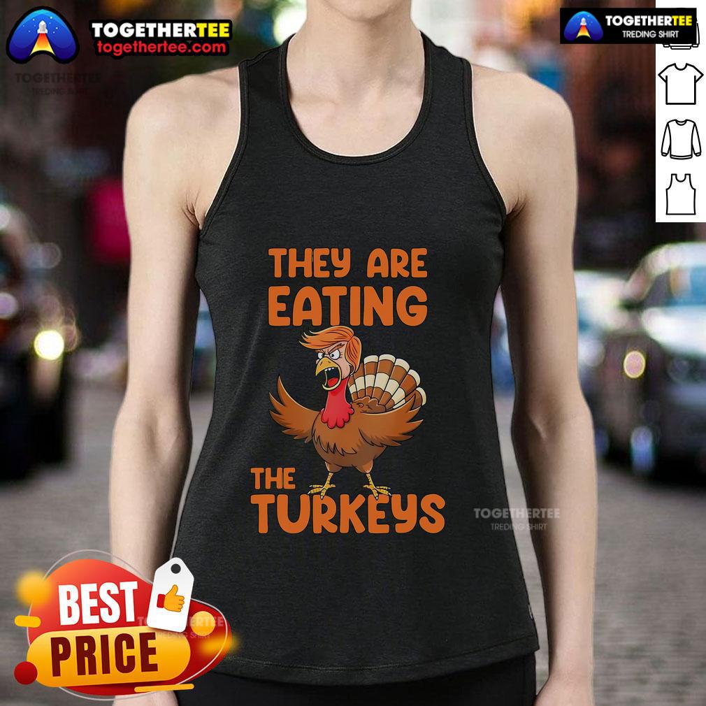 Premium Trump Turkey Tank Top featuring a humorous Thanksgiving design with turkeys, perfect for festive celebrations.