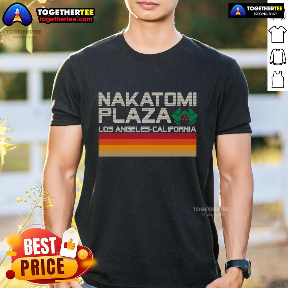 Retro Nakatomi Plaza T-shirt featuring iconic Los Angeles skyline design, perfect for fans of classic films and vintage style.