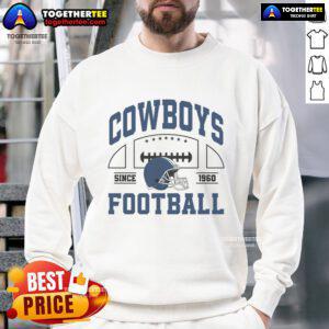 Supporter wearing a Nice Cowboys Football Team sweatshirt since 1960, showcasing team pride and style.