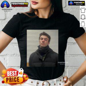 Official Luigi Mangione's mugshot released on a ladies tee, featuring a bold graphic design and vibrant colors.