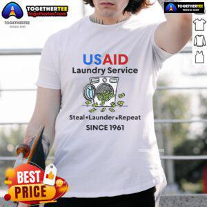 Hot Usaid Laundry Service T-Shirt featuring 'Laundering Money Since 1961' slogan, perfect for humor and laundry lovers.