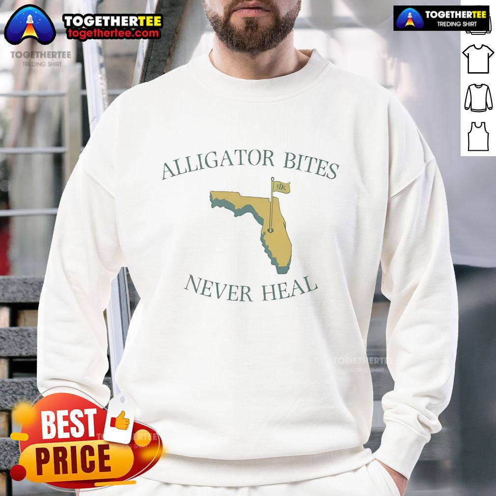 Florida sweatshirt featuring 'Official Alligator Bites Never Heal' design, perfect for alligator lovers and wildlife enthusiasts.