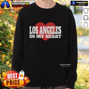 Cozy Pretty Los Angeles in My Heart sweatshirt displayed on a model against a vibrant city backdrop, showcasing urban style.
