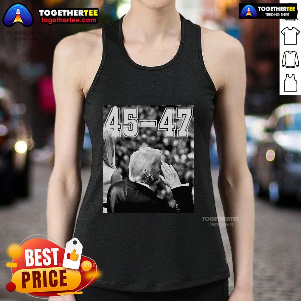 President Trump saluting in a vintage tank top, showcasing military pride in the Top 45-47 collection.