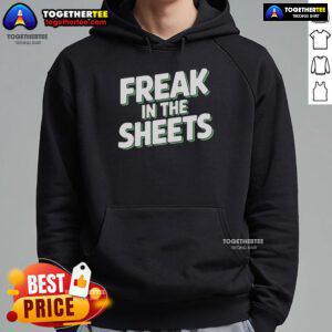 Cozy Top Freak in the Sheets Hoodie displayed on a hanger, featuring bold text design and soft fabric in a stylish setting.
