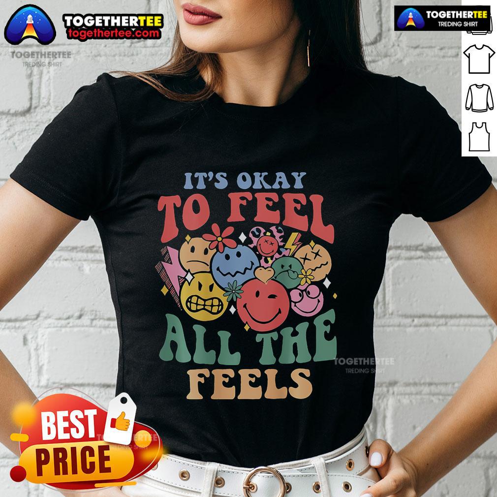 Groovy ladies tee featuring 'It's Okay To Feel All The Feels' slogan, promoting positive mental health awareness and self-acceptance.
