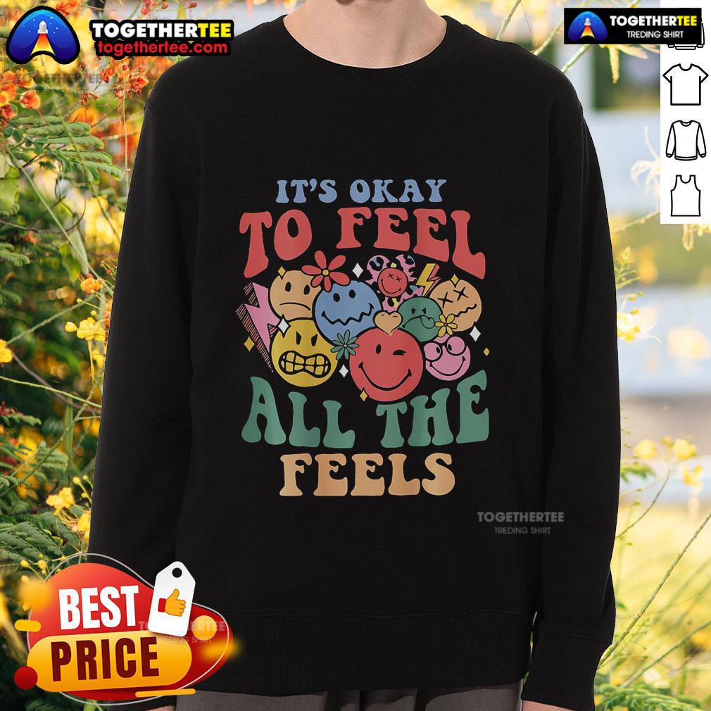 Groovy sweatshirt featuring 'It's Okay To Feel All The Feels' slogan, promoting mental health awareness and self-acceptance.