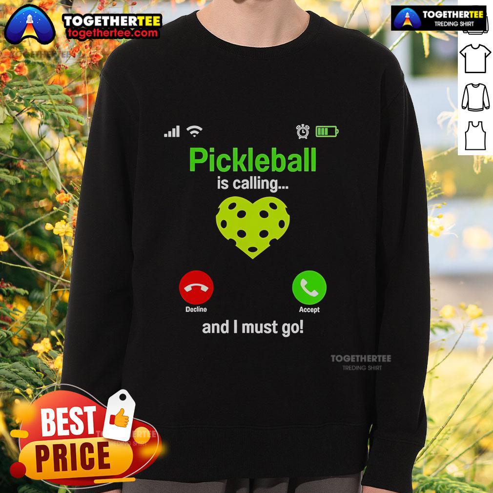 Cozy 'Top Pickleball Is Calling And I Must Go' sweatshirt in vibrant colors, perfect for pickleball enthusiasts.
