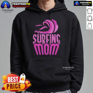 Top surfing mom wearing a hoodie with surfer sayings, showcasing her love for surfing and motherhood on the beach.