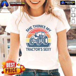 Funny 'She Thinks My Tractor's Sexy' vintage farmer ladies tee, featuring a playful tractor graphic and stylish design.
