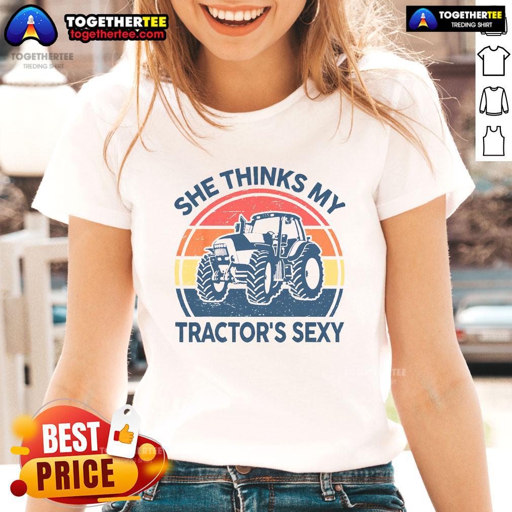Funny 'She Thinks My Tractor's Sexy' vintage farmer ladies tee, featuring a playful tractor graphic and stylish design.