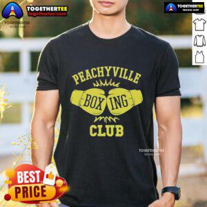 Official Dungeons And Daddies Peachyville Boxing Club T-Shirt featuring a vibrant design and logo for fans of the show.