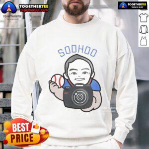 Official Los Angeles Team Photographer Jon Soohoo wearing a stylish sweatshirt, capturing vibrant sports moments.