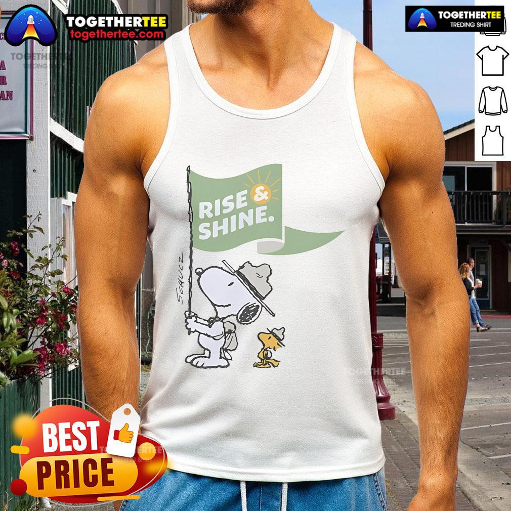 Alt Text: Official Snoopy and Woodstock Rise Shine Flag Tank Top featuring vibrant graphics of iconic characters on a stylish tee.