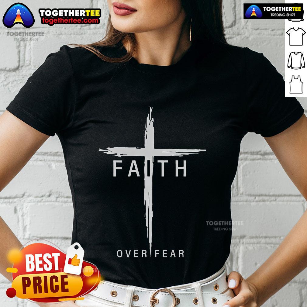 Women's Christian tee featuring a cross and 'Top Faith Over Fear' design inspired by Jesus Christ.