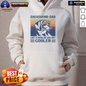 Funny vintage dachshund hoodie design featuring 'Dad like a regular dad but cooler' text, perfect for dog lovers.
