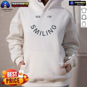 Smiling person wearing a 'Good The Last Five Years' hoodie, showcasing a vibrant design and cheerful expression.
