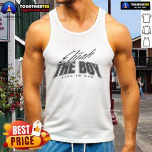 Nice Elijah wearing a 'The Boy' live in NYC tank top, showcasing vibrant urban style and music culture in the city.