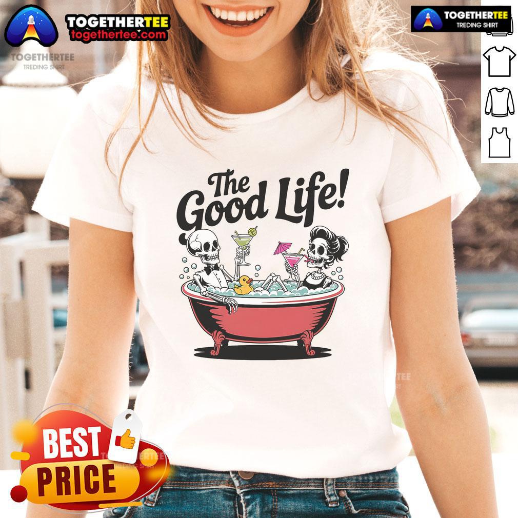 Skeletons in a bathtub enjoying a vacation, featured on the 'Nice Living The Good Life' ladies tee design.