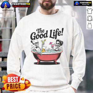 Skeletons enjoying the good life in a bathtub, sipping drinks in a vacation sweatshirt, embodying fun and relaxation.