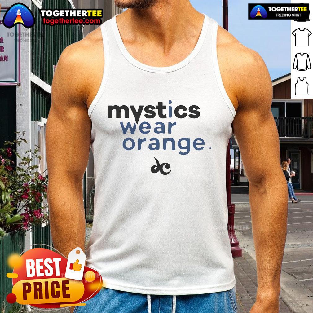 Nice mystics wearing orange tank tops, showcasing vibrant fashion and spiritual vibes in a sunny outdoor setting.