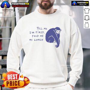 Chimpanzee wearing 'Tell Me I'm Tired, Feed Me My Lunch' sweatshirt, showcasing a fun and cozy vibe with vibrant ruby color.