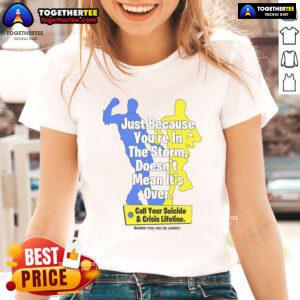 Official Just Because You're In The Storm Ladies Tee promoting mental health awareness and suicide crisis lifeline support.