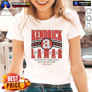 Alt Text: Official Kendrick Lamar 'They Tried To Rig The Game' Ladies Tee featuring star design and impactful message.