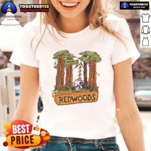 Alt Text: Official Peanuts Snoopy X California Redwoods ladies tee featuring a stylish design with iconic Snoopy among redwood trees.