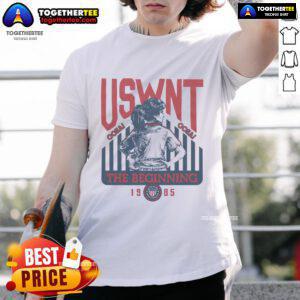 Official USWNT The Beginning 1985 T-Shirt featuring vintage design and bold team colors celebrating women's soccer history.