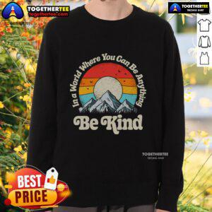 Premium 'Be Kind' sweatshirt with retro sunset design, promoting kindness in a stylish and comfortable way.