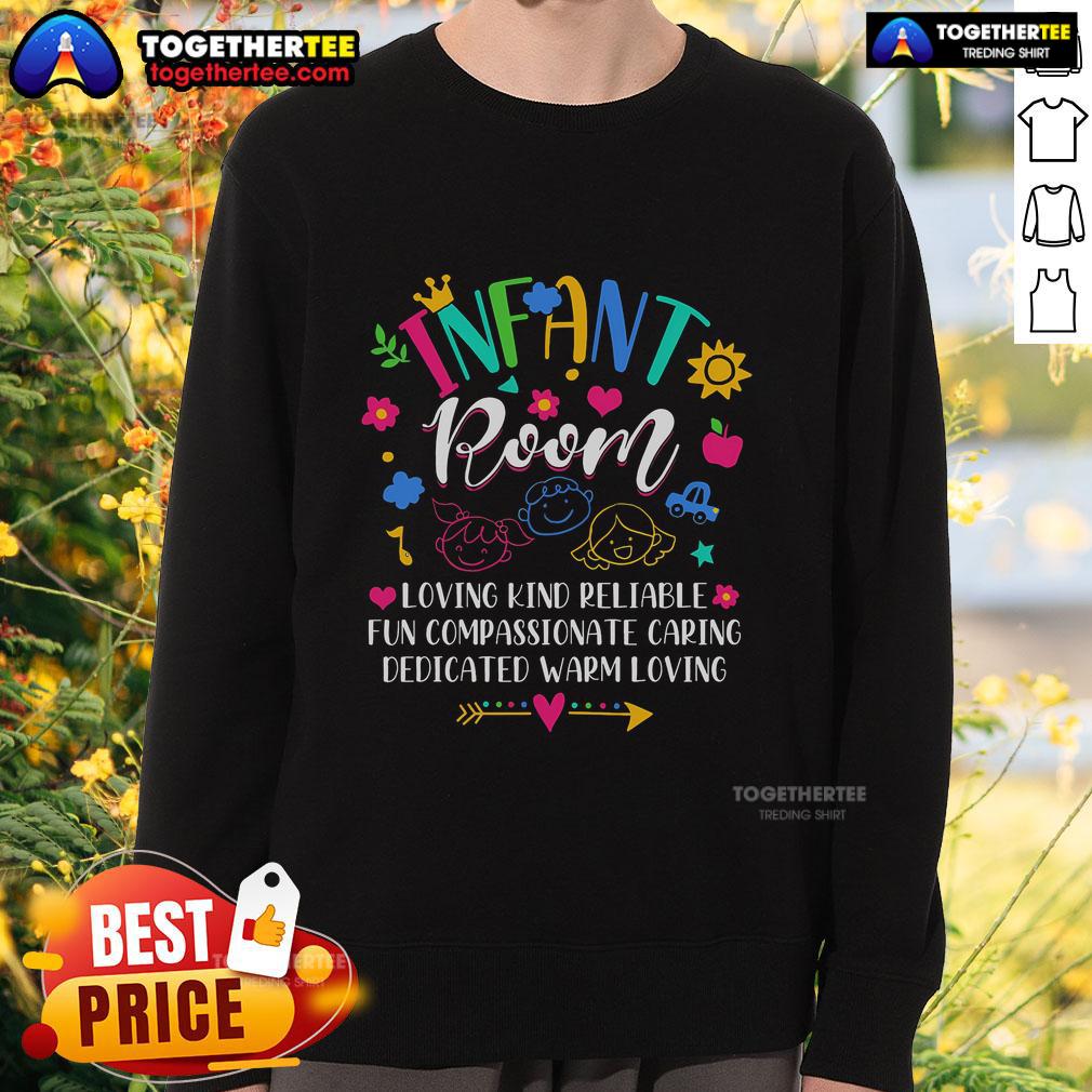 Daycare provider in a cozy infant room wearing a loving and compassionate sweatshirt, creating a fun environment for kids.