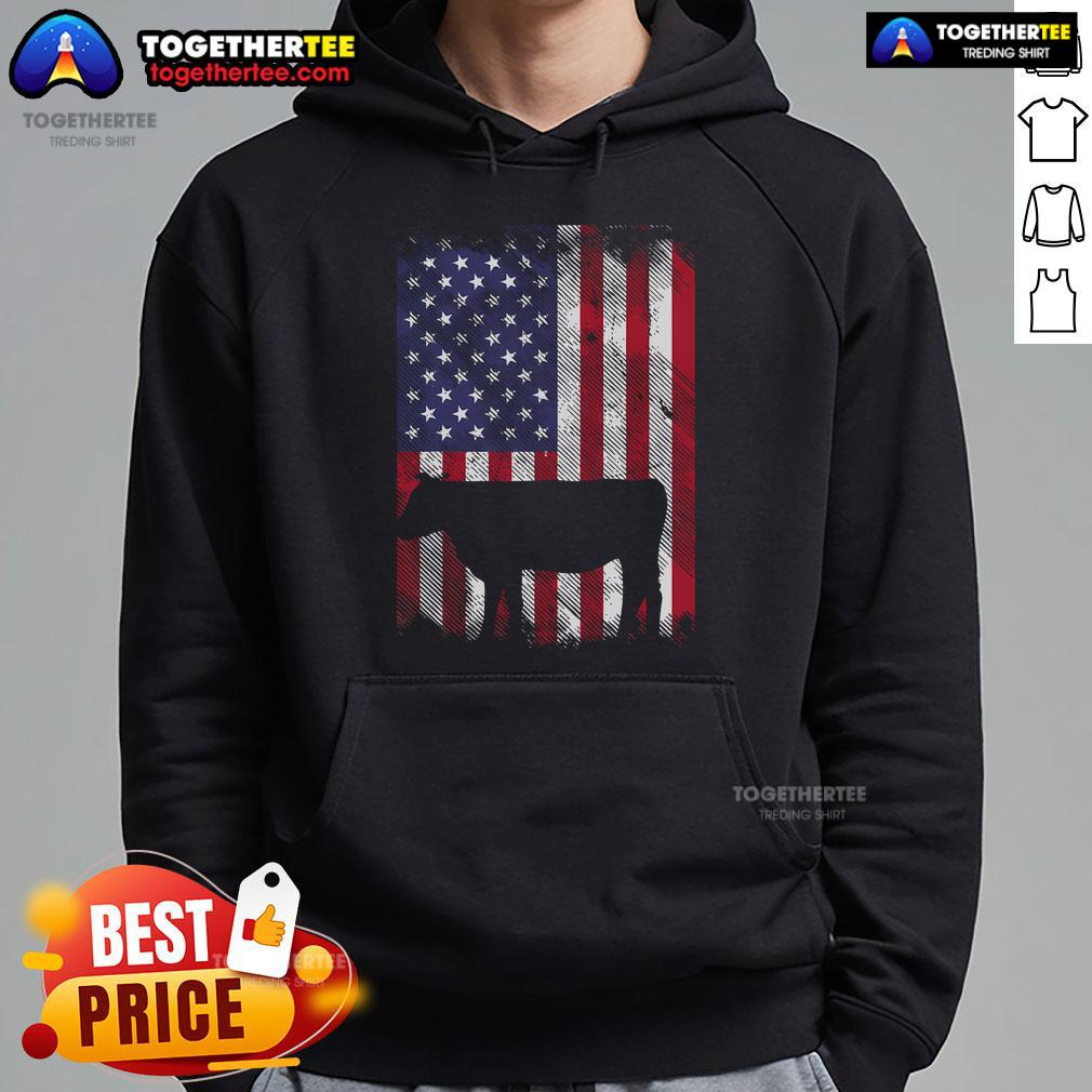 Vintage farm hoodie featuring a patriotic cow with an American flag, perfect for farmers and Americana enthusiasts.