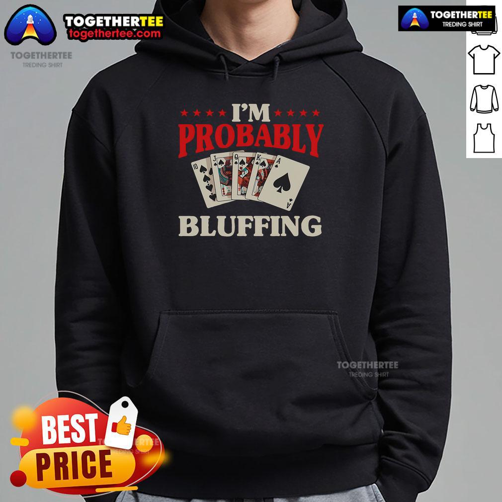 Alt Text: Gambler wearing 'Top I'm Probably Bluffing' hoodie at a casino poker card game, showcasing a fun poker-themed design.