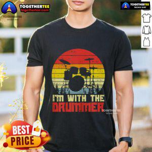 Alt Text: Retro sunset t-shirt featuring 'I'M With The Drummer' design, perfect for drum enthusiasts and music lovers.