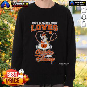 Cozy sweatshirt featuring Mickey Mouse, perfect for nurses who love Orioles and Disney, showcasing fun and comfort.