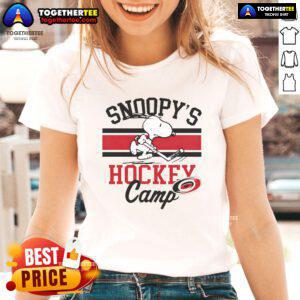 Good Snoopy Carolina Hurricanes Snoopy's Camp Ladies Tee featuring a playful Snoopy design for hockey fans.