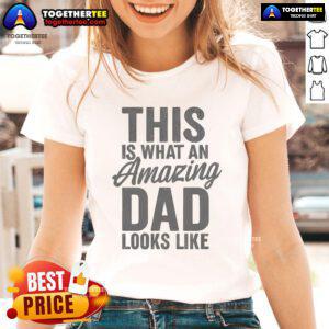 Alt Text: Amazing dad wearing a stylish tee that says 'Nice, This Is What An Amazing Dad Looks Like' for Father's Day.